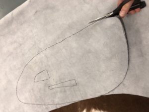 Cutting the cowhide
